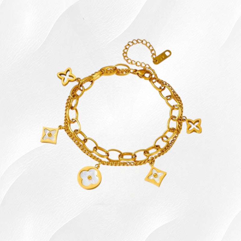 Gouden schakelarmband met bedels