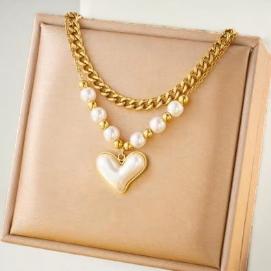 Gouden dubbele ketting met parels en hartje