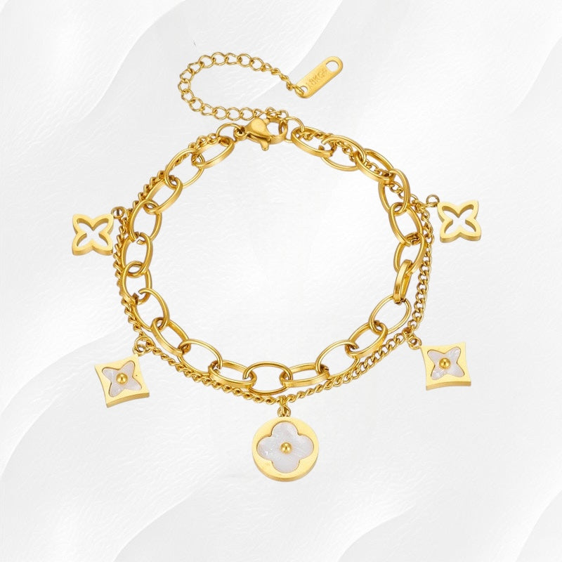Gouden schakelarmband met bedels