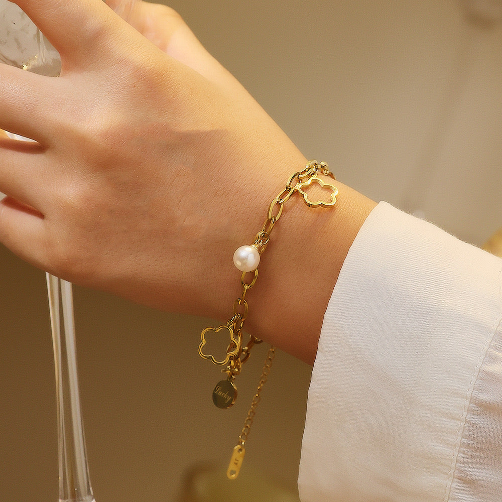 Gouden bedelarmband