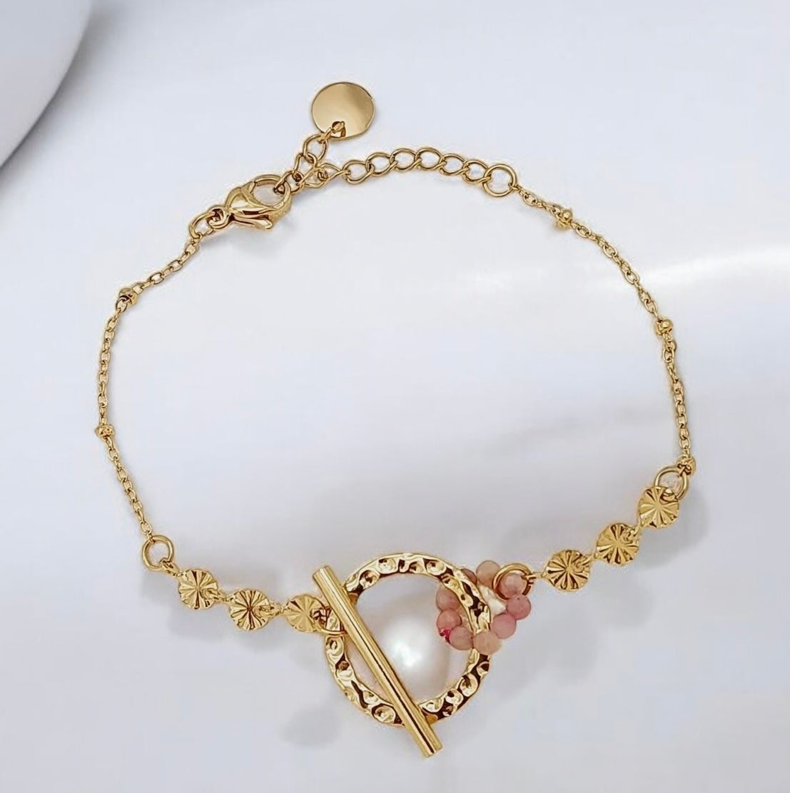 Gouden armband met roze accenten - Ylova